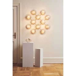 Liila 12 Wandlamp/Plafondlamp Nordic Gold/Optic Clear - Nuura - Koop Online -Verlichting Opslag Nuura sho room Liila 12 Optic 2